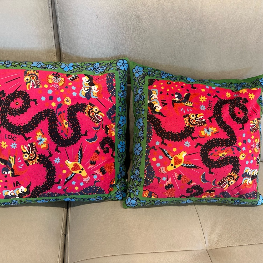 Red and Green Accent Pillows with Intricate Embroidery